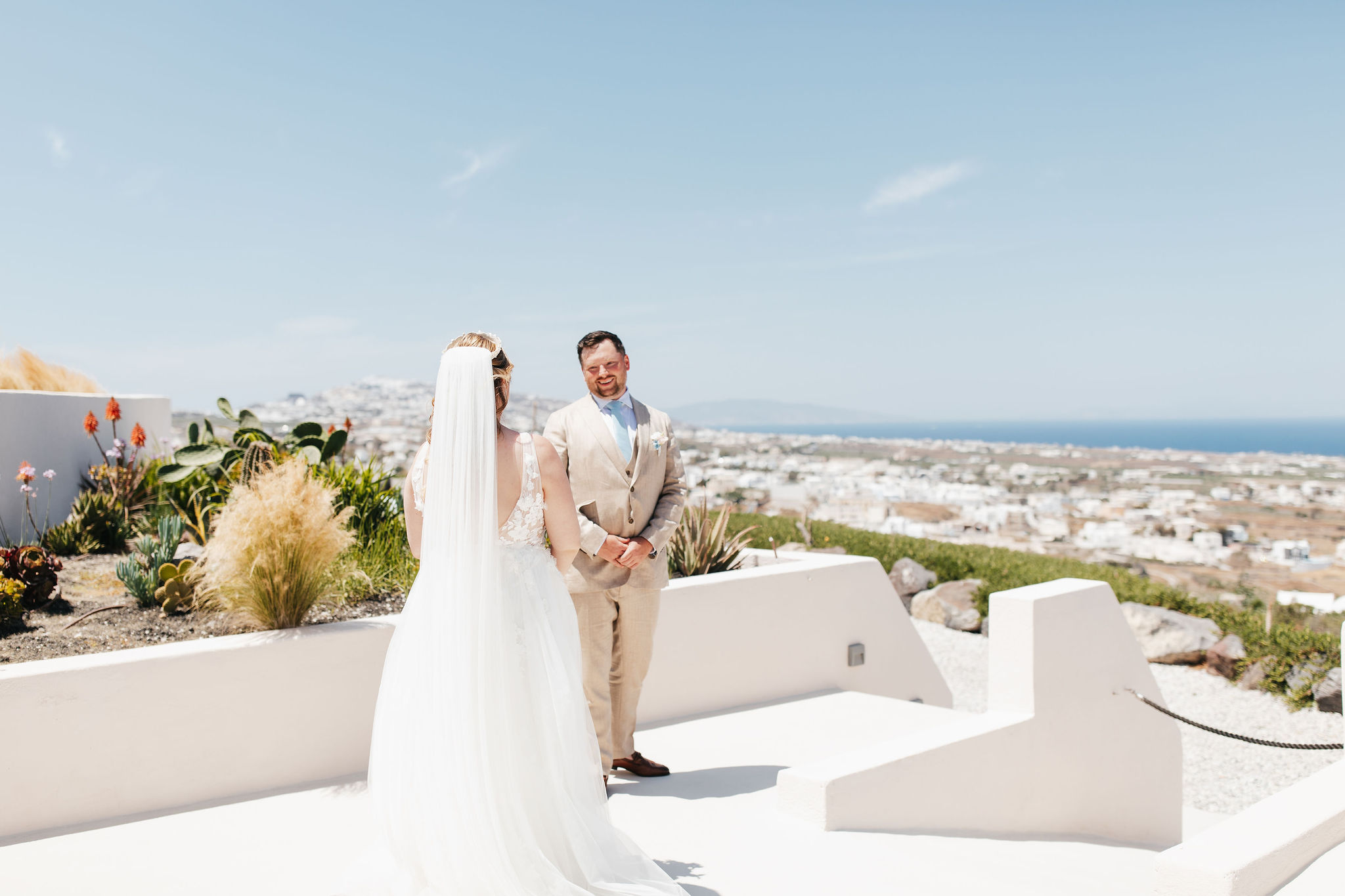 Bride and groom first look at their destination wedding in Greece