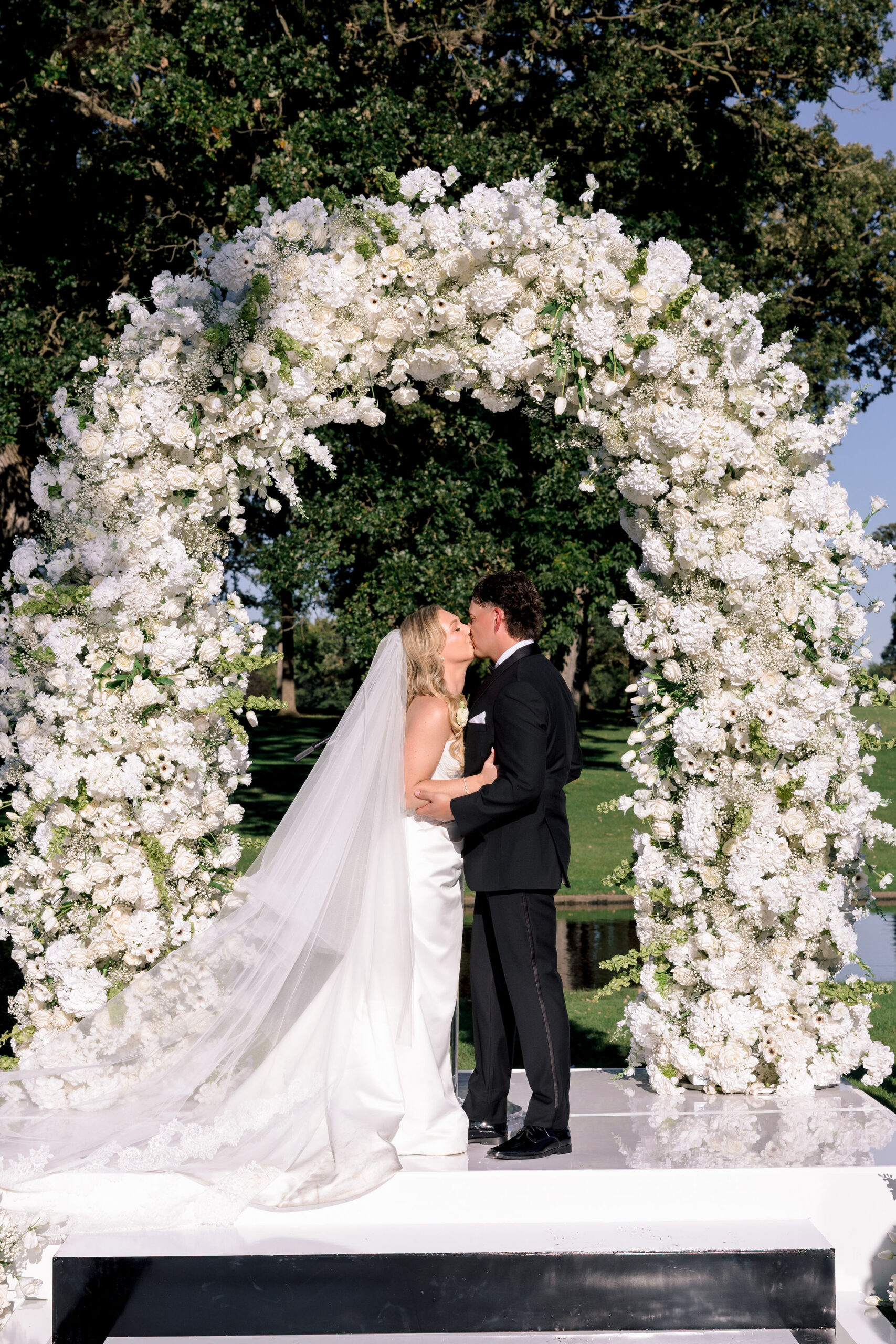 Couple kisses during therapy Medinah Country Club wedding ceremony
